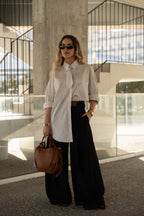 Camisa oversize de rayas con detalle de lazo.