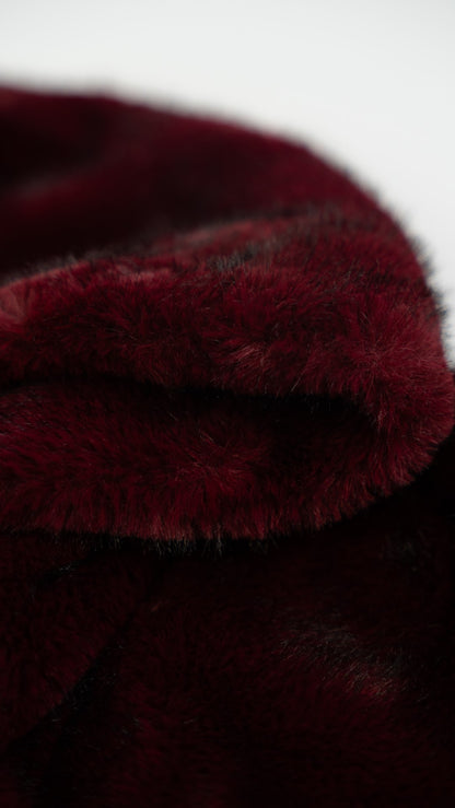 Bordeaux fur coat with hood.