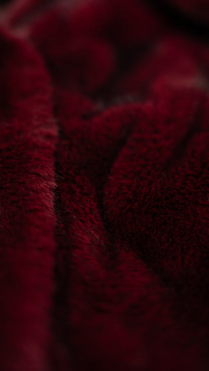 Bordeaux fur coat with hood.