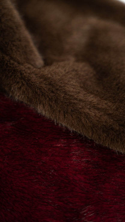 Brown fur coat with hood.