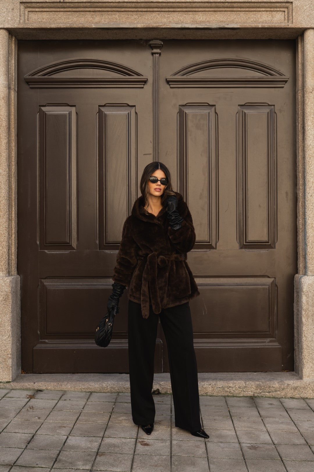 Brown fur coat with hood.