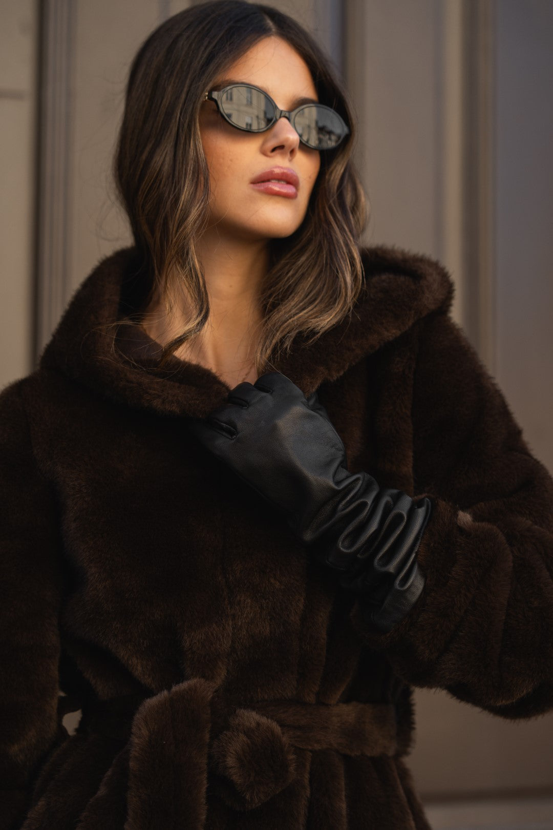 Brown fur coat with hood.