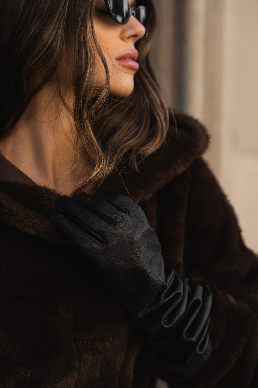 Brown fur coat with hood.