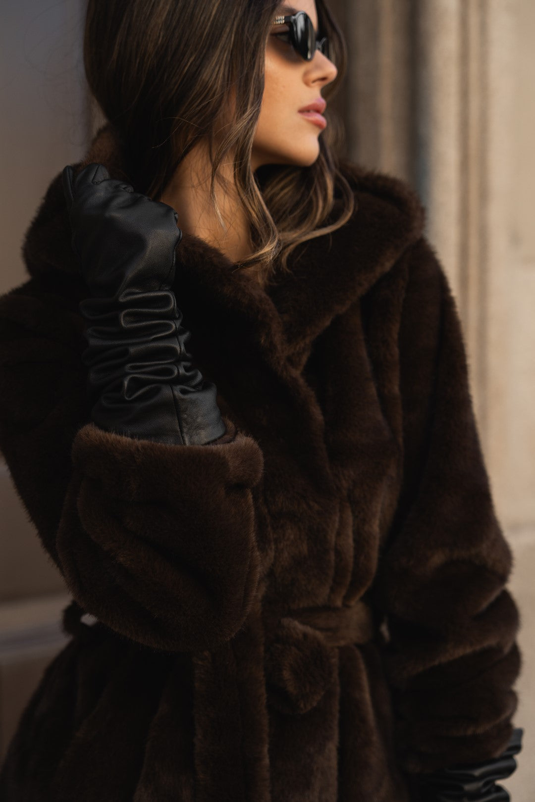 Brown fur coat with hood.