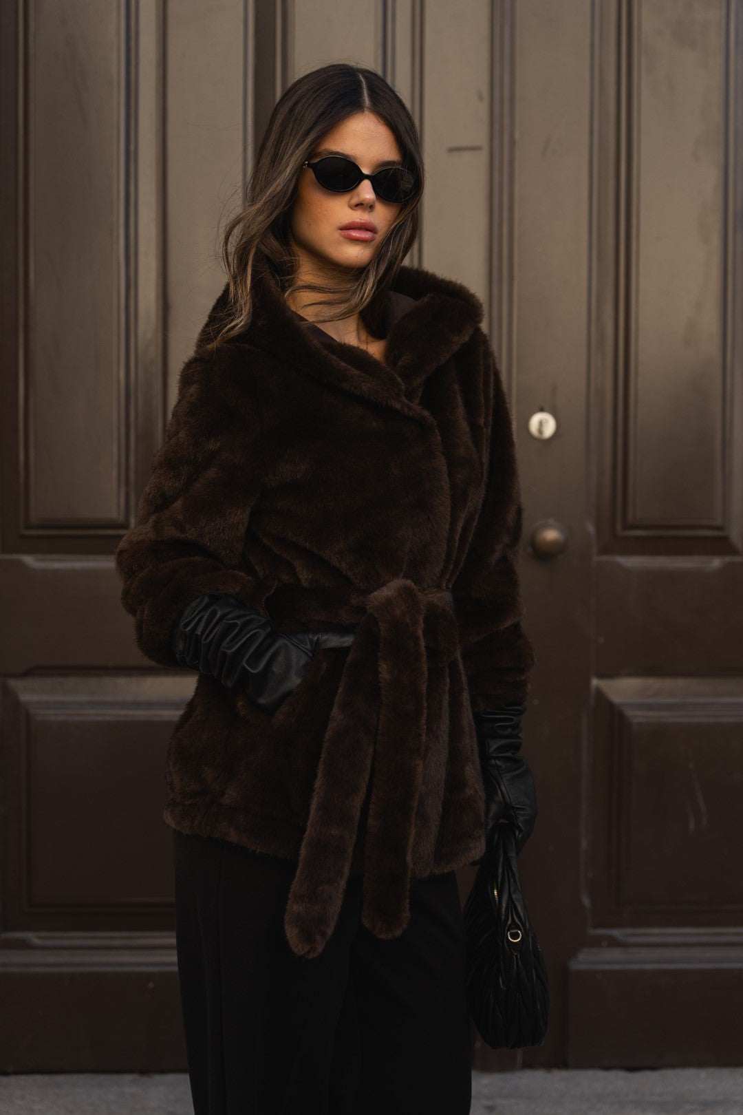 Brown fur coat with hood.