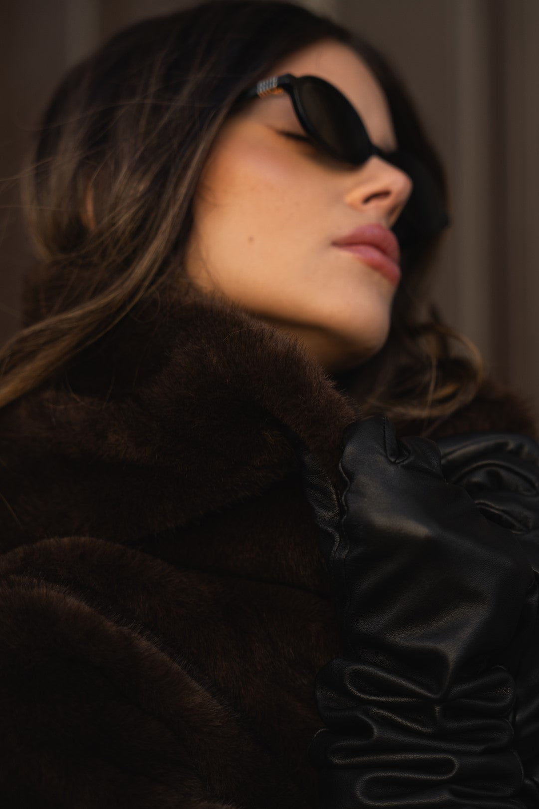 Brown fur coat with hood.