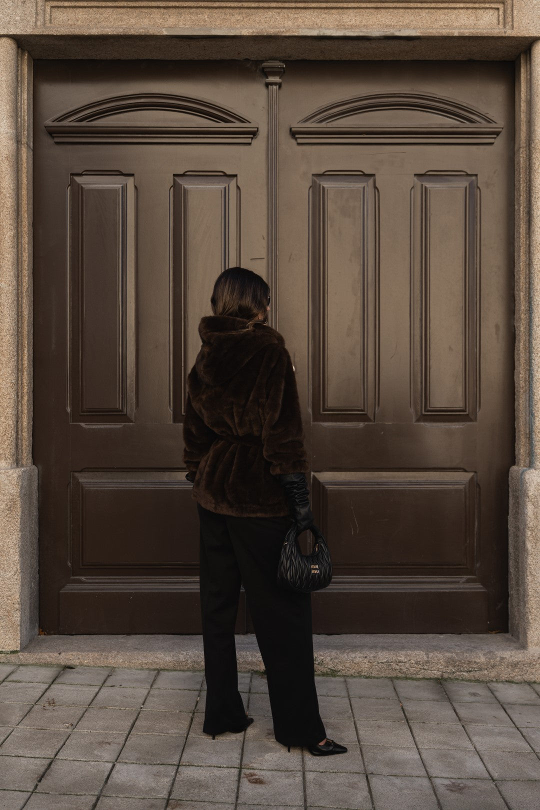 Brown fur coat with hood.