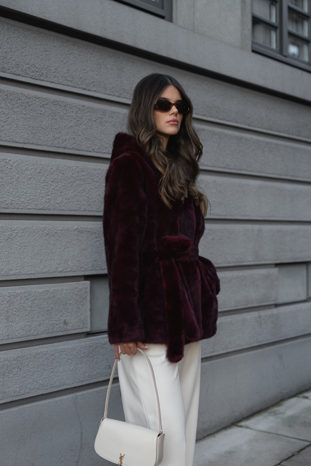 Bordeaux fur coat with hood.