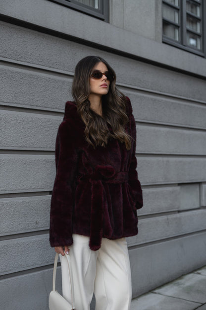 Bordeaux fur coat with hood.