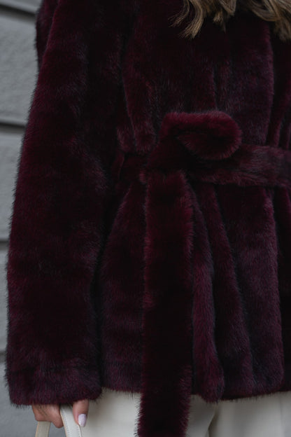 Bordeaux fur coat with hood.
