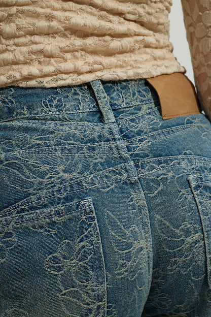 Jeans a palloncino con fiori cuciti