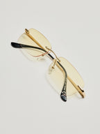 Gafas rectangulares con degradado amarillo