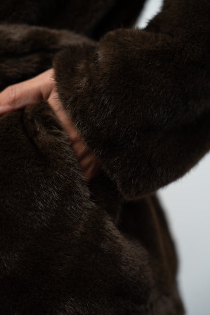 Brown fur coat with hood.