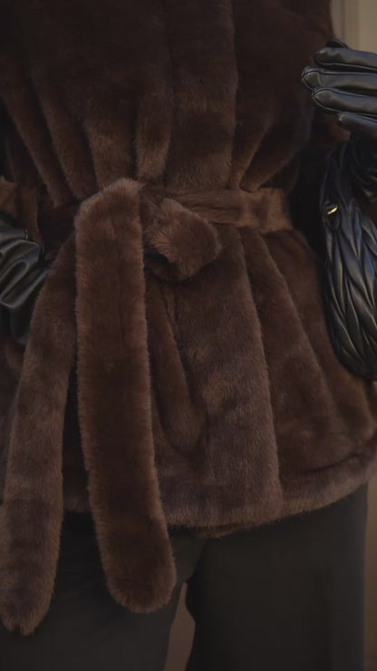 Brown fur coat with hood.