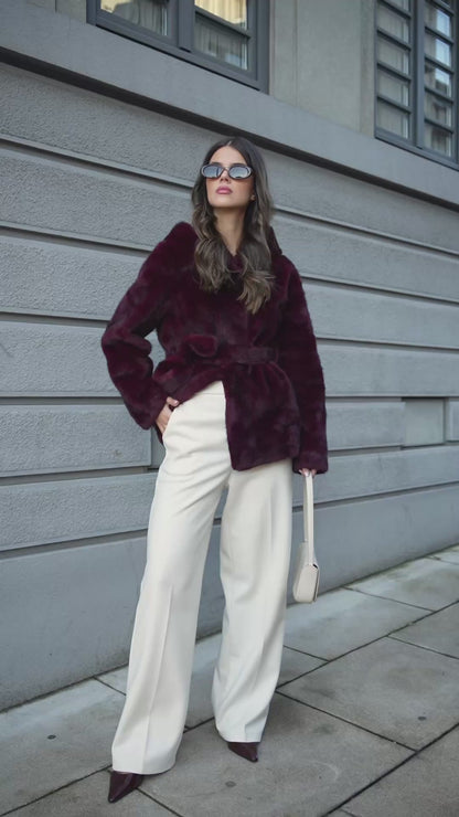 Bordeaux fur coat with hood.