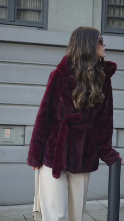 Bordeaux fur coat with hood.